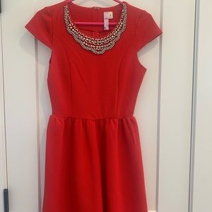 Red mini cocktail dress with beading on neck line